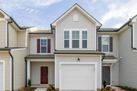 Well-maintained gutters on a modern residential home Tulsa, OK, showcasing the type of results of professional gutter repair services by Tier-One Roofing.